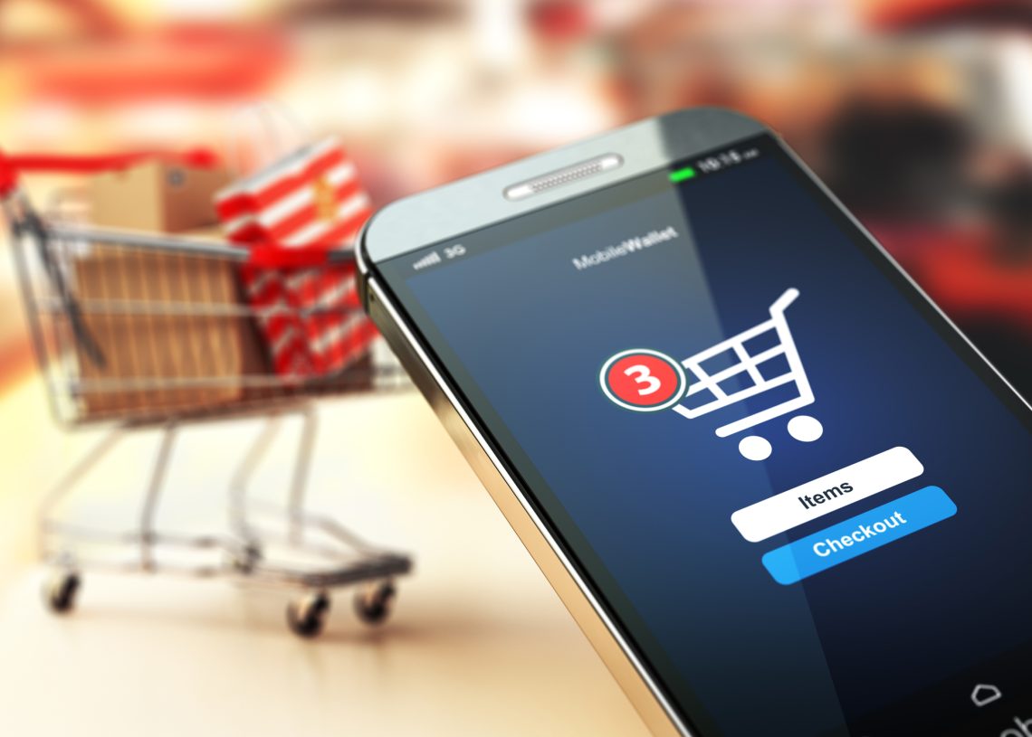 Online shopping concept nackground. Mobile phone or smartphone with cart and boxes and bag. 3d